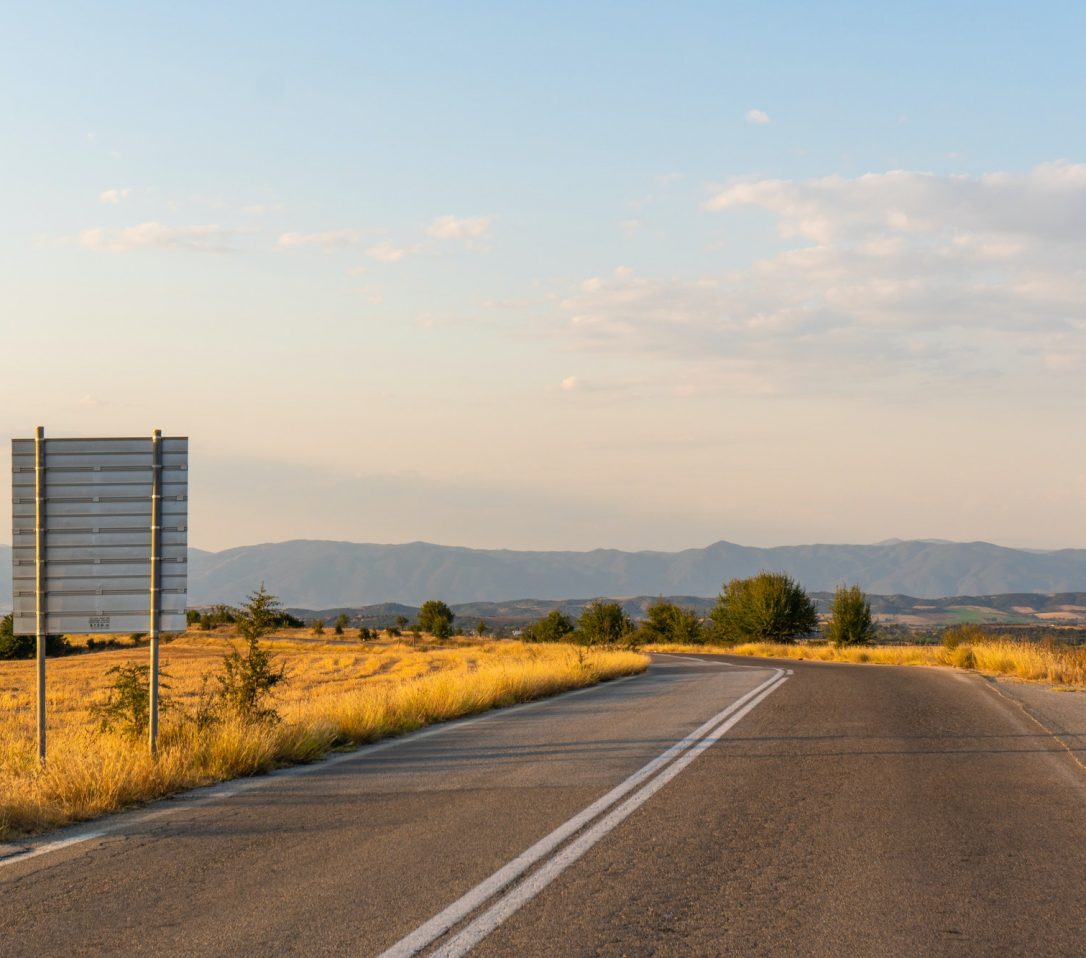 Road shield by the road in Greece
